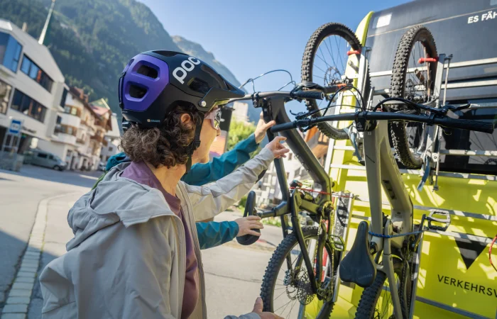 Bicycles are secured on the bus